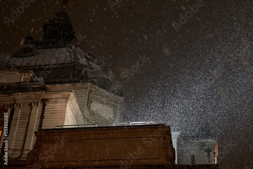 London in snow at night in December 