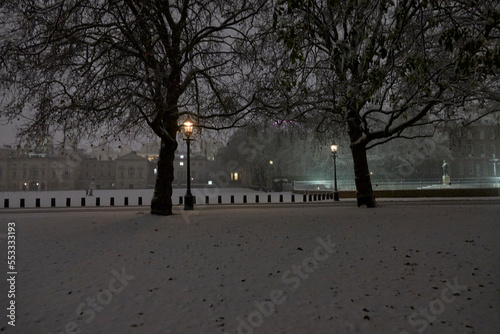 London in snow at night in December 