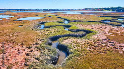 Fényképezés Winding creek zigs and zags through marshes of Maine