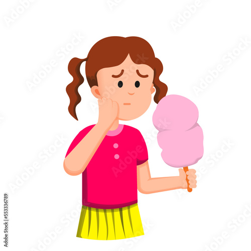 a little girl had a toothache while eating cotton candy