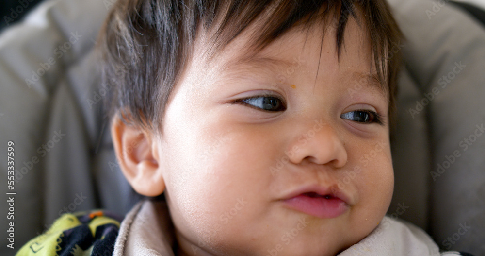closeup of cute mixed race half asian baby boy smiling and laughing
closeup of cute mixed race half asian baby boy smiling and laughing