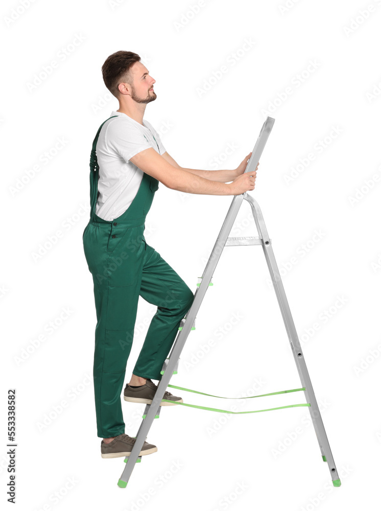 Worker in uniform climbing up metal ladder on white background Worker in uniform climbing up metal ladder on white background