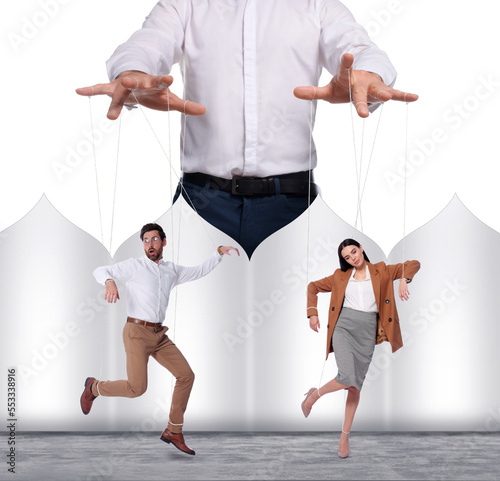 Human relationships demonstrated in puppet show. Workers manipulated by director or manager on white background