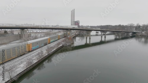 Wallpaper Mural Lansing GM plant with train going by establishing shot aerial Torontodigital.ca