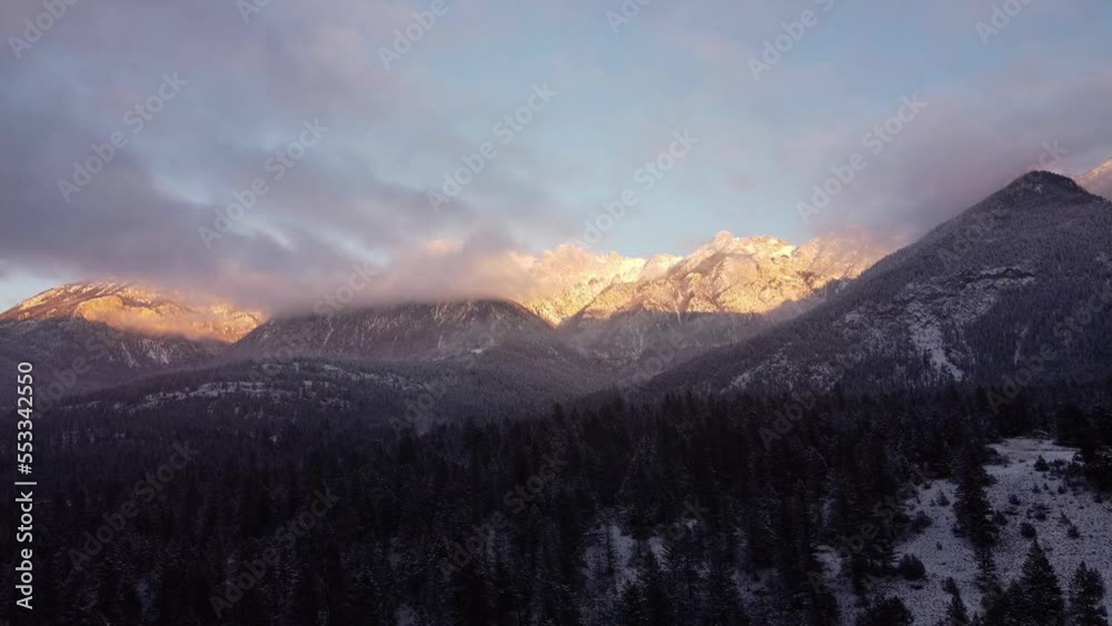 Aerial shot of sunset in the Rocky Mountains in winter Aerial shot of sunset in the Rocky Mountains in winter