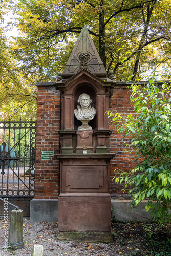 View of famous Old North Cemetery of Munich, Germany with historic gravestones.