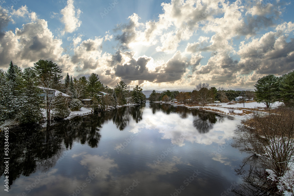 Reflection houses on lake winter day cold and beautiful Reflection houses on lake winter day cold and beautiful