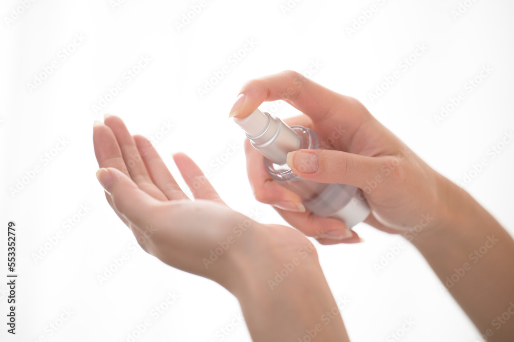 Close-up of the hand trying to apply lotion or serum Close-up of the hand trying to apply lotion or serum