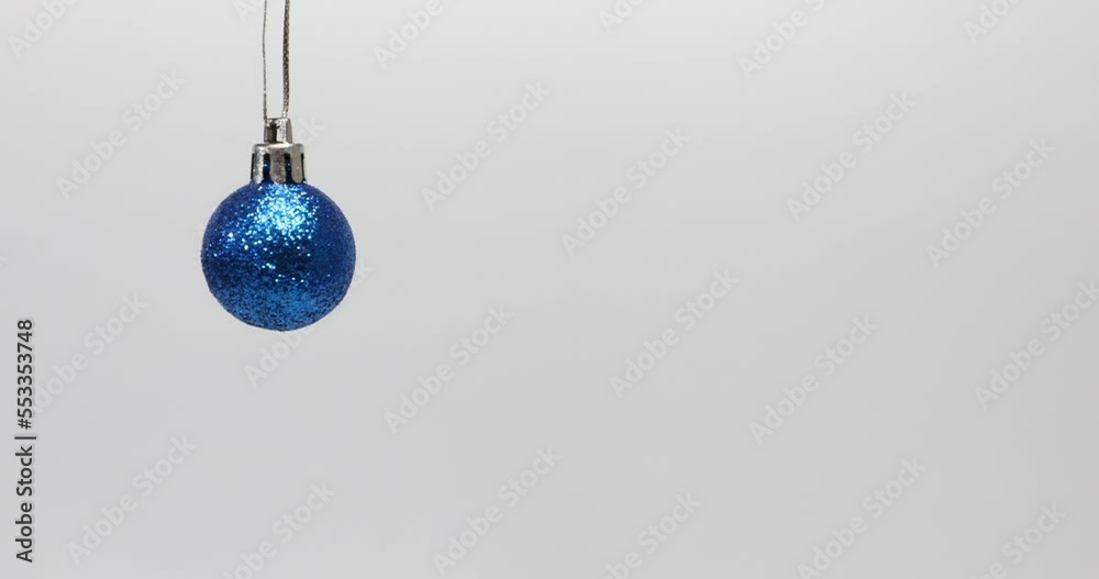 Christmas blue ball on white background. Christmas decoration traditional ornaments.