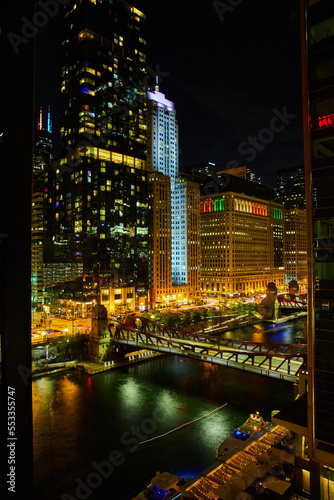 Night life on Chicago ship canals with bridge and skyscrapers © Nicholas J. Klein