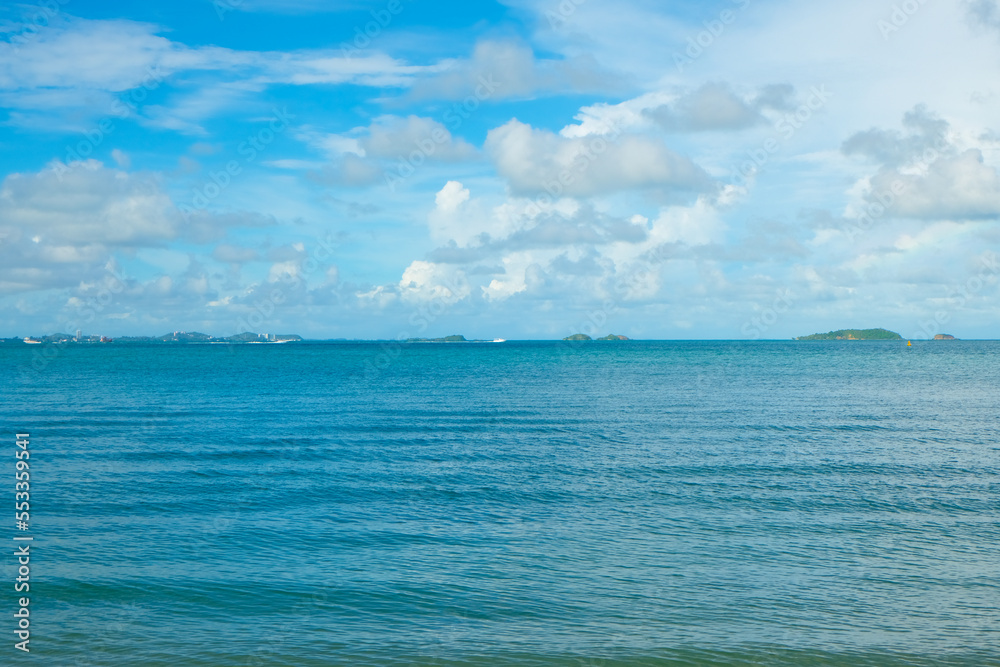 Tropical sea beach wave blue sky with fluffy cloud Tropical sea beach wave blue sky with fluffy cloud