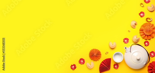 Teapot and Chinese symbols on yellow background with space for text