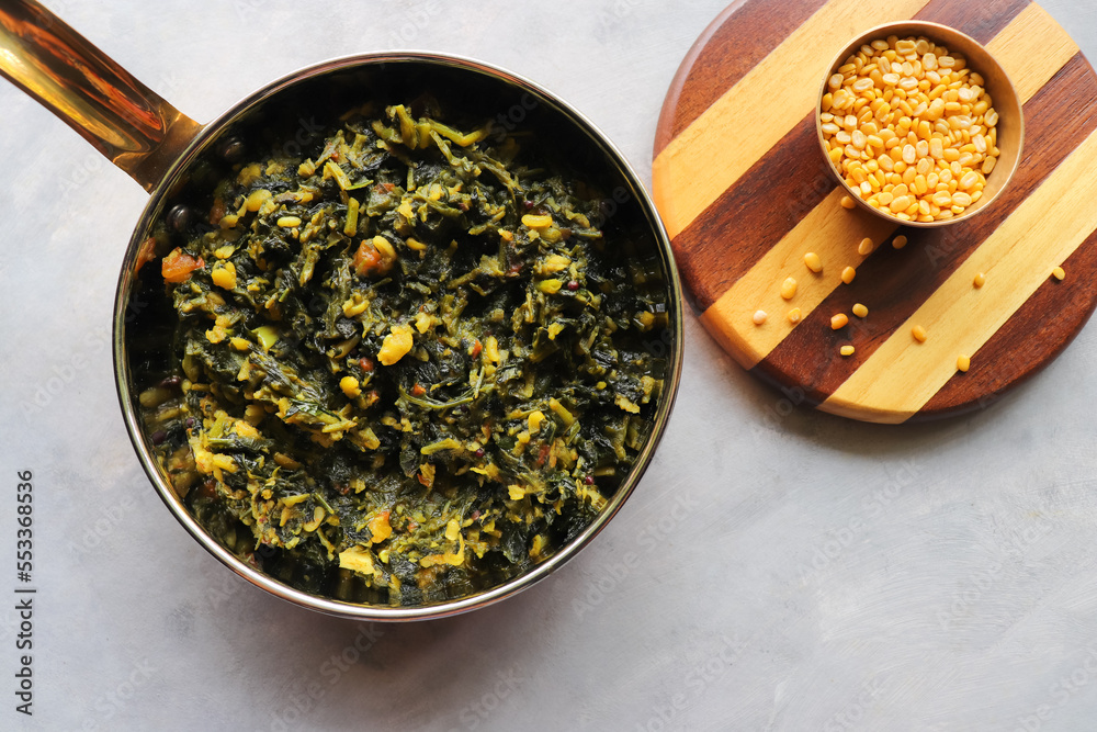 Palak and Moong dal sabzi. also known as spinach and lentil curry. Healthy green leafy