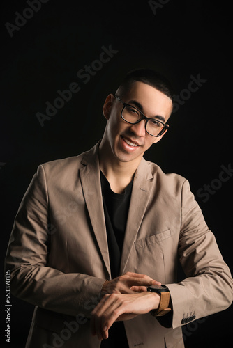 Fashionable Asian man with ...