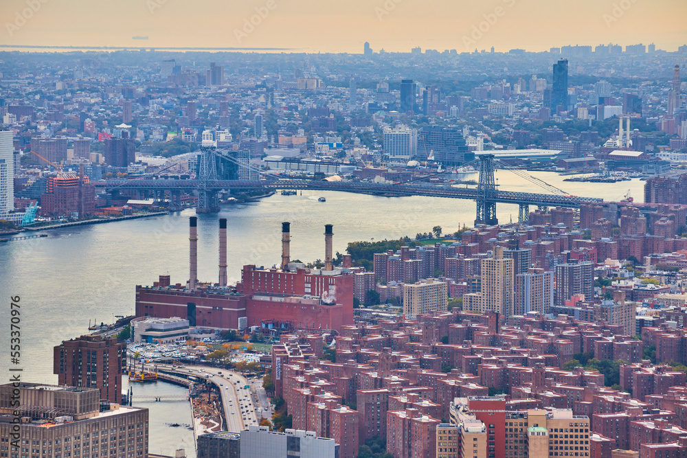 Fototapeta premium High over Manhattan apartments overlooking New York City industrial area and bridge