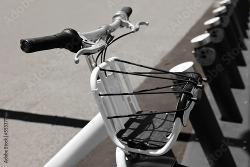 Fototapeta Naklejka Na Ścianę i Meble -  Modern bicycle parked on city street, closeup