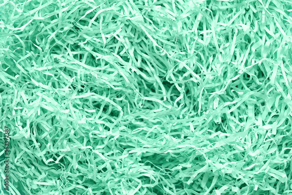 Closeup view of mint shredded paper as background Closeup view of mint shredded paper as background