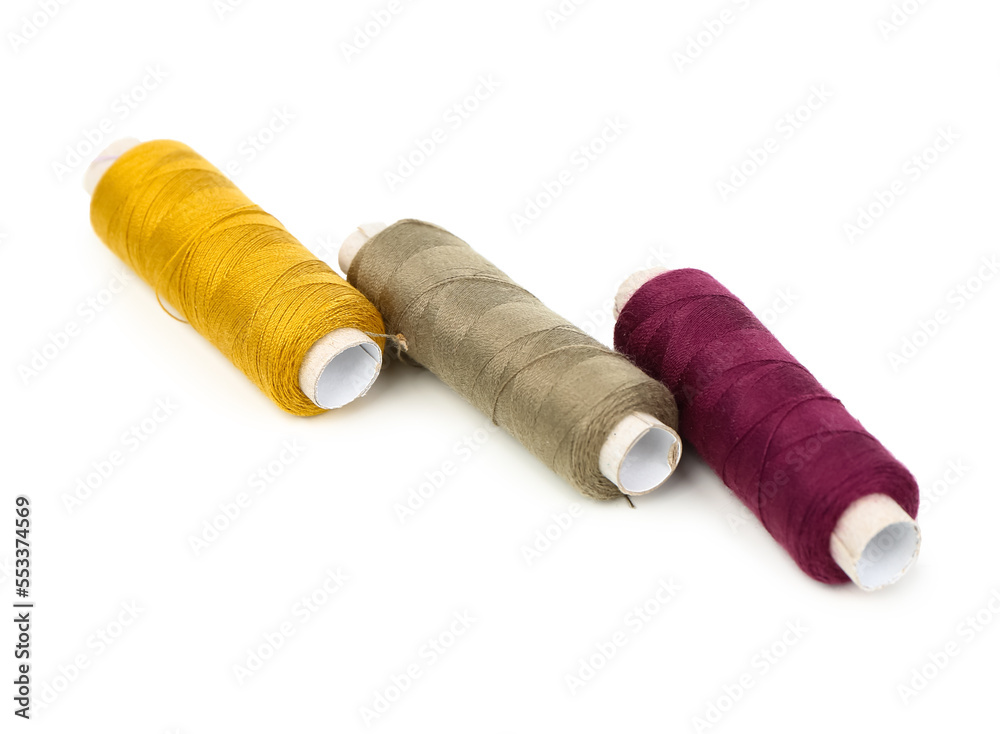Sewing thread spools isolated on white background Sewing thread spools isolated on white background