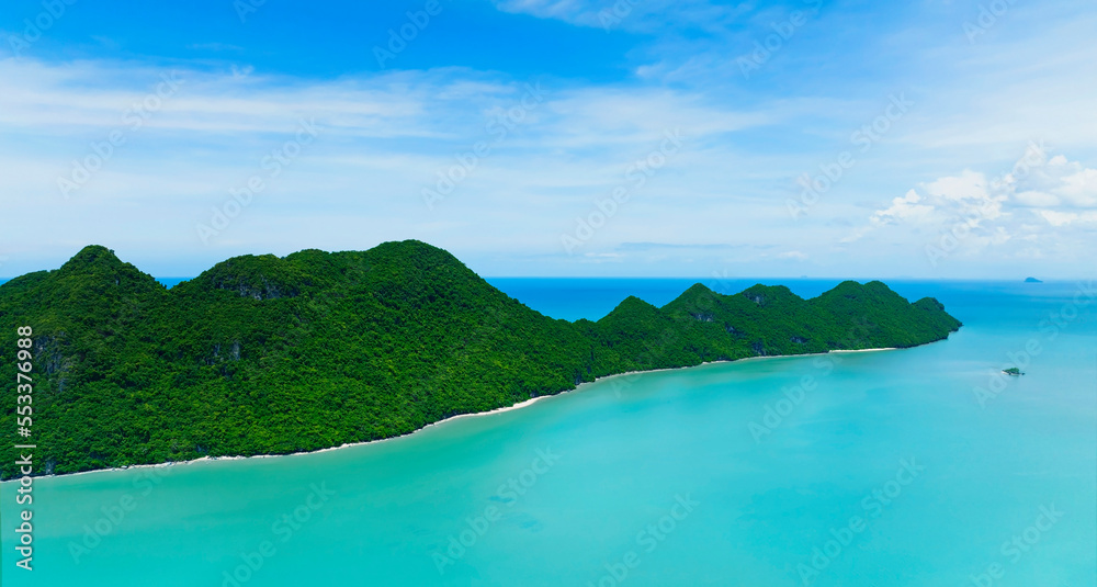 The tropical with seashore as the island in a coral reef ,blue and turquoise sea Amazing nature landscape with blue lagoon-above view
