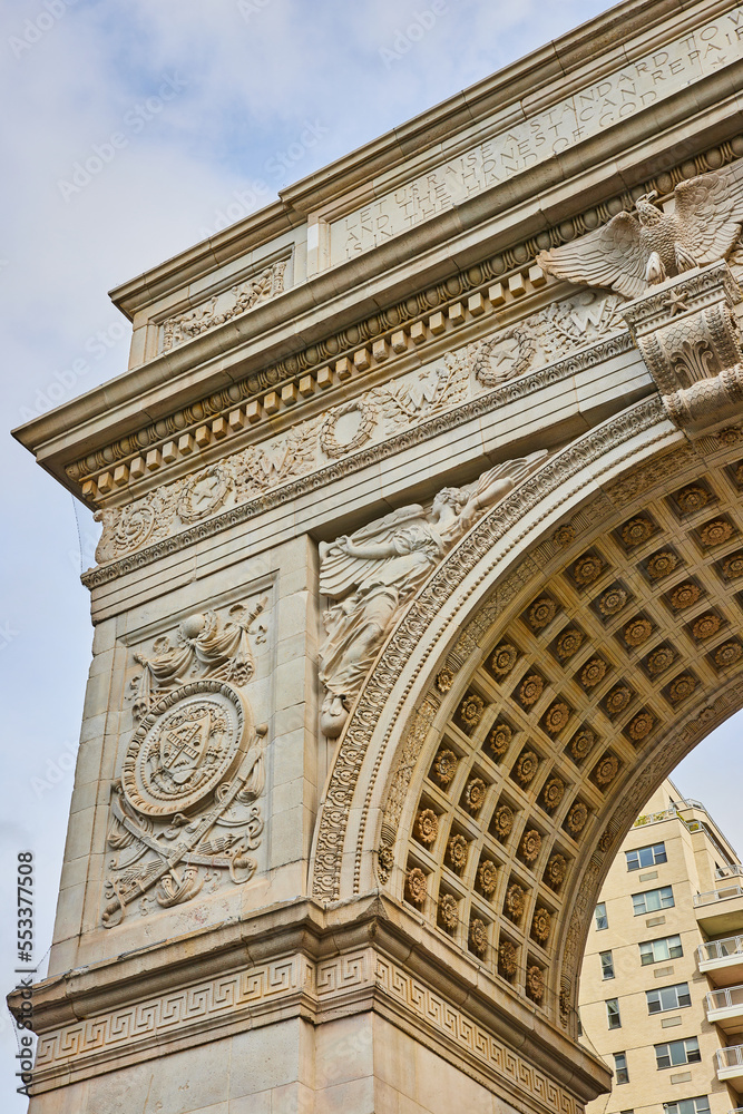 Detail of top corner of limestone Washington Square Park arch in New York City