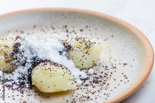 potato gnocchi with poppy seeds and sugar photo