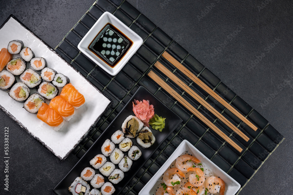 Various dishes of Asian cuisine with typical sushi Various dishes of Asian cuisine with typical sushi