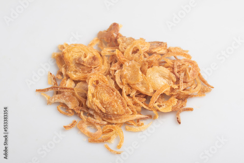 Crispy fried onion slices on a white background