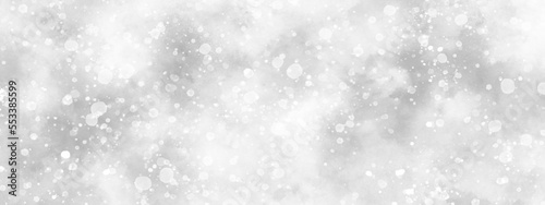 Abstract cloudy white background with snowflakes, beautiful white watercolor background with glitter particles, white bokeh background for wallpaper, invitation, cover and design. 