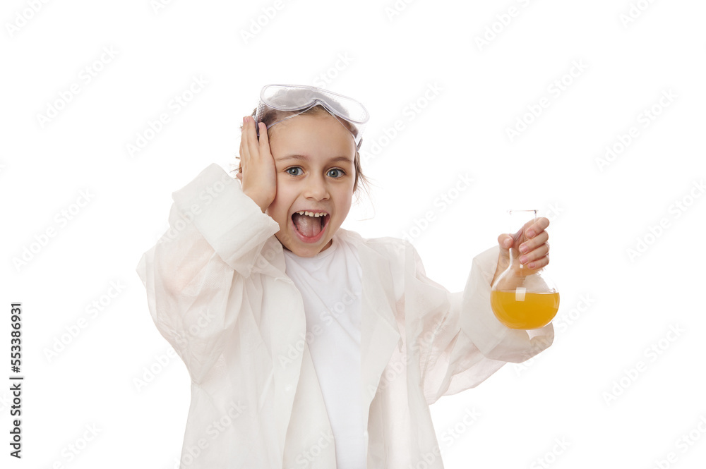 Excited amazed little girl, school kid, young chemist scientist in white lab coat, conducting a scientific experiment or chemical reaction at chemistry laboratory, isolated on white background Excited amazed little girl, school kid, young chemist scientist in white lab coat, conducting a scientific experiment or chemical reaction at chemistry laboratory, isolated on white background
