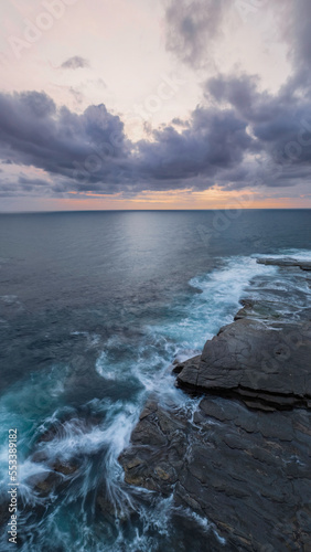 Sunrise over the sea and rocky Inlet