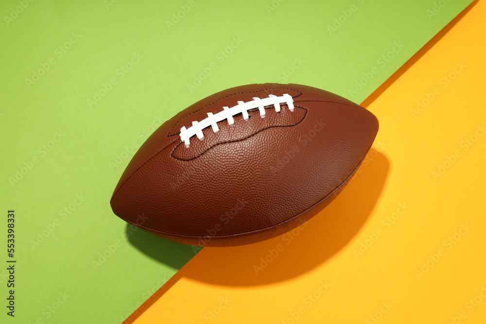 American football ball on two tone background American football ball on two tone background