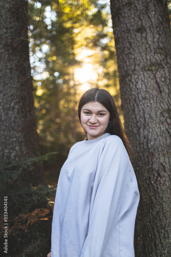The girl rests in the mountains and enjoys life. A happy and smiling girl spends her weekend in the mountains. Rest and travel. The girl rests in the mountains and enjoys life. A happy and smiling girl spends her weekend in the mountains. Rest and travel.