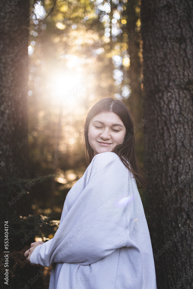 The girl rests in the mountains and enjoys life. A happy and smiling girl spends her weekend in the mountains. Rest and travel. The girl rests in the mountains and enjoys life. A happy and smiling girl spends her weekend in the mountains. Rest and travel.