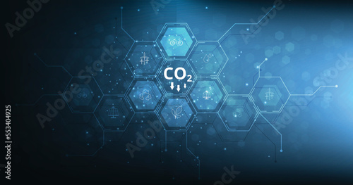 Idea of reduce CO2 emissions to limit global warming.Lower CO2 levels with sustainable development on renewable energy, planting tree and green energy to stop climate change.