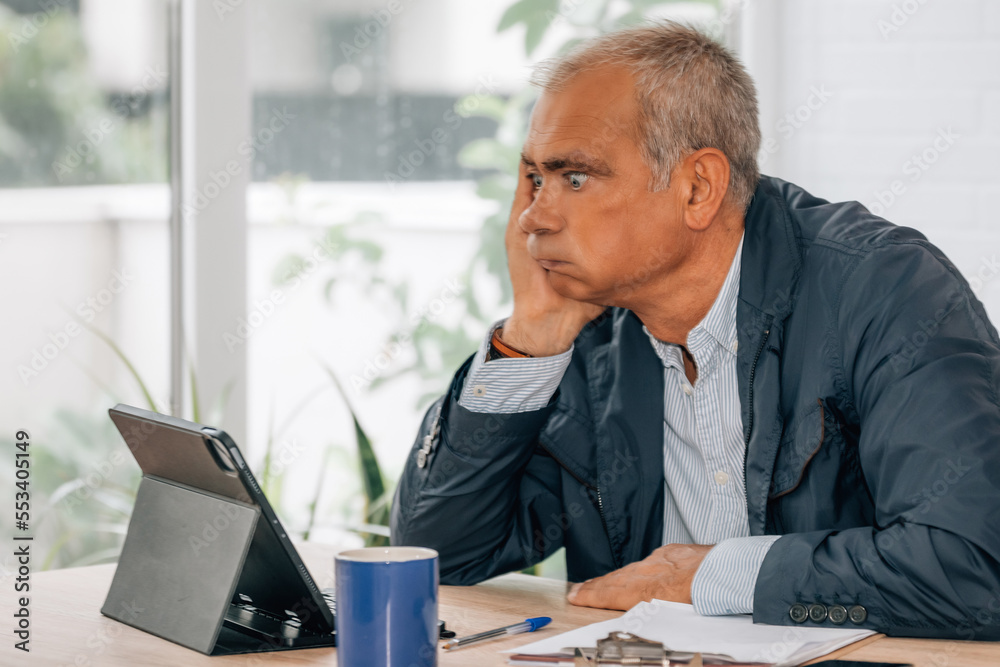 businessman in the office depressed or tired businessman in the office depressed or tired