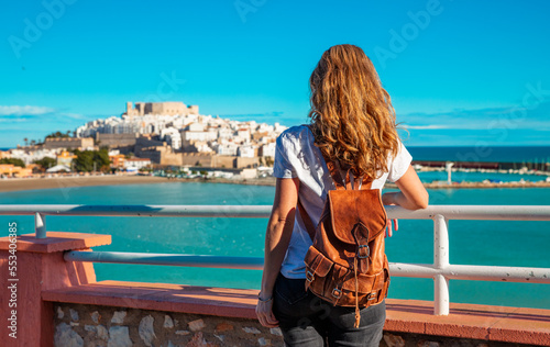 Woman tourist looking at Peniscola city landscape,  Castellon in Spain