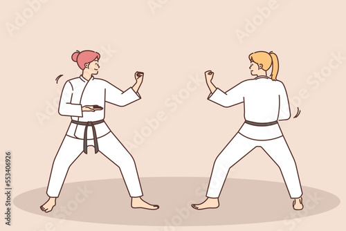 Women practice martial arts