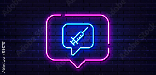 Neon light speech bubble. Vaccine message line icon. Vaccination syringe sign. Jab symbol. Neon light background. Vaccine message glow line. Brick wall banner. Vector