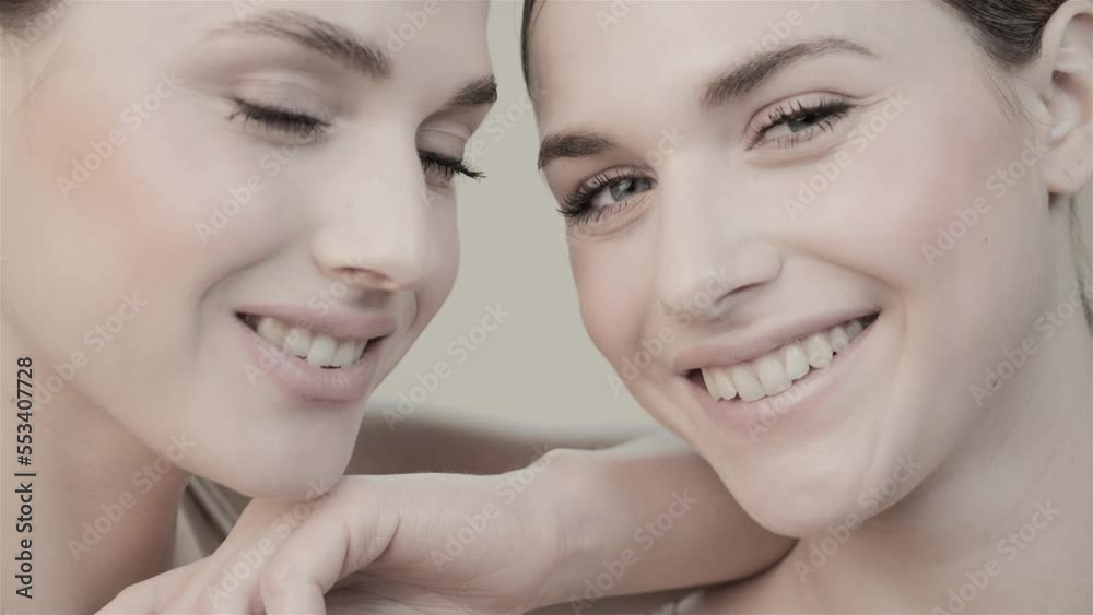 Skin care. Two women. Clean skin. The faces of a young women. Skin rejuvenation procedures. Saved the procedure. Anti-aging cream. Natural beauty and femininity. Natural cosmetics. Smile. Skin care. Two women. Clean skin. The faces of a young women. Skin rejuvenation procedures. Saved the procedure. Anti-aging cream. Natural beauty and femininity. Natural cosmetics. Smile.