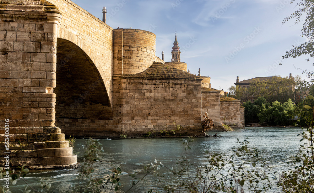 The Stone Bridge (Puente de Piedra) crossing the Ebro river. Medieval architecture in Zaragoza, Spain