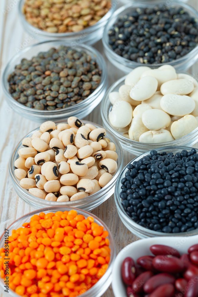 Lentils, legumes and beans on white surface Lentils, legumes and beans on white surface