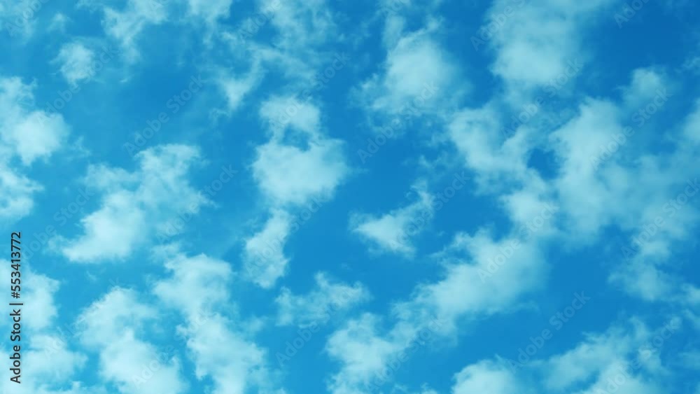 Time Lapse Beautiful Sunny Azure Sky and Cotton Fluffy White Clouds Flying Up. Summer Blue Cloudy Skyscrapers in Good Weather. Cumulus White Clouds in the Blue Sky. Ozone, Atmospheric Layer, Religion. Time Lapse Beautiful Sunny Azure Sky and Cotton Fluffy White Clouds Flying Up. Summer Blue Cloudy Skyscrapers in Good Weather. Cumulus White Clouds in the Blue Sky. Ozone, Atmospheric Layer, Religion.