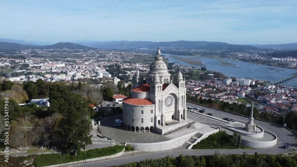 Breathtaking drone view of the castle above the town of viana do castelo in portugal, sun!