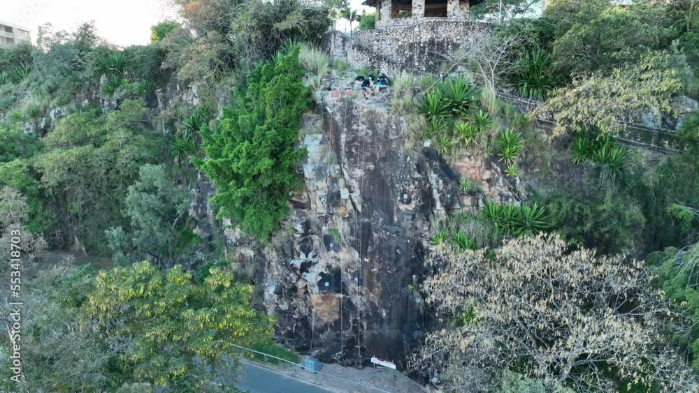 Drone panning shot of Man Descending Brisbane's Kangaroo Point Cliffs, shot at sunrise. Brisbane 4K Drone panning shot of Man Descending Brisbane's Kangaroo Point Cliffs, shot at sunrise. Brisbane 4K