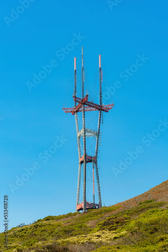 patrial sutro tower with grassy hillside foreground