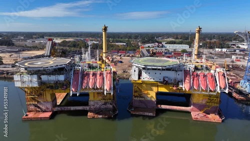 Oil rigs at port in Mobile Alabama ready for shipment. Aerial view. photo