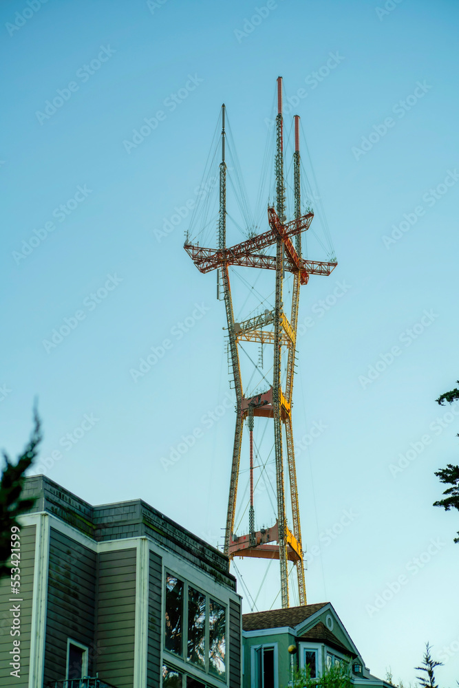Sutro communications tower in downtown san francisco california with sunrise on edge or metal scafolding exterior Sutro communications tower in downtown san francisco california with sunrise on edge or metal scafolding exterior
