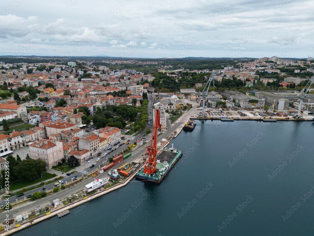 Floating Cranes and dockside Pula Croatia drone aerial view