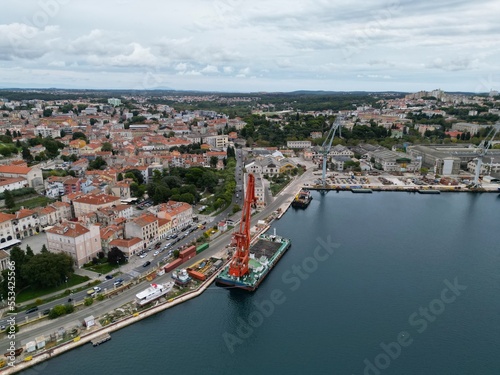 Floating Cranes and dockside Pula Croatia drone aerial view