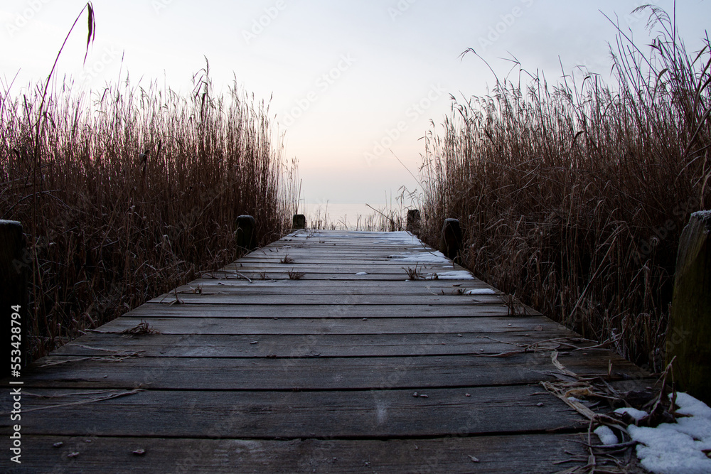 Fototapeta premium jetty by the sea in winter